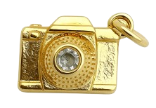 Home 20251128 2357 golden camera charm remix 01kb79s4c3fhc9v6m158h3854v removebg preview